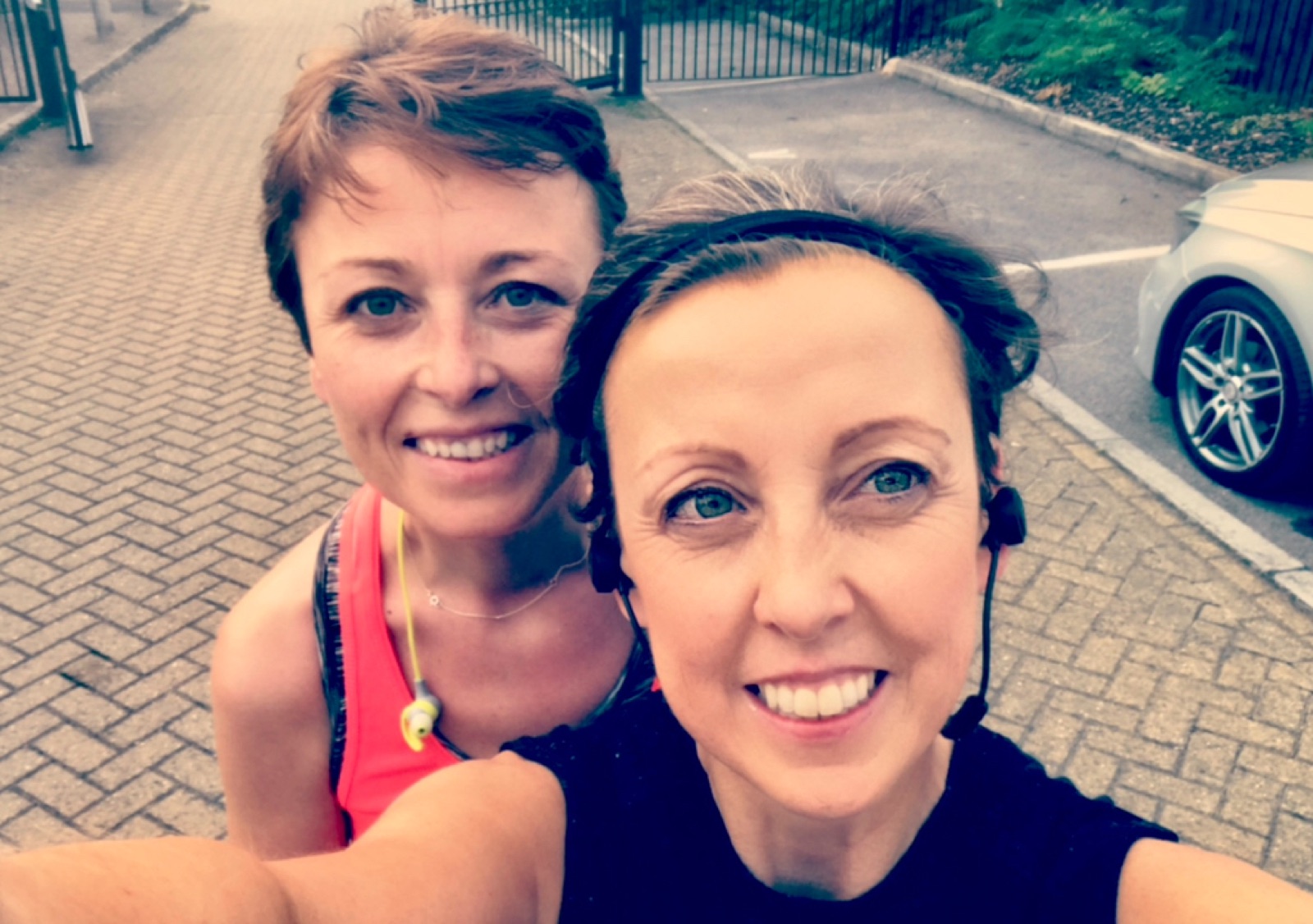 Cathy and Tracey smiling together after a run