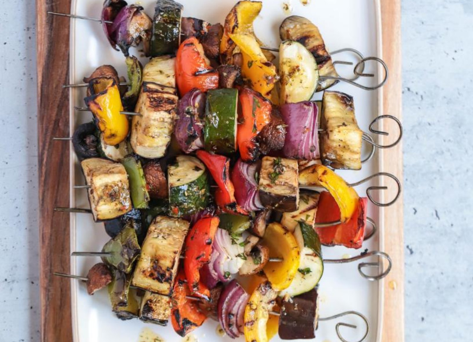 A platter of grilled vegetable skewers